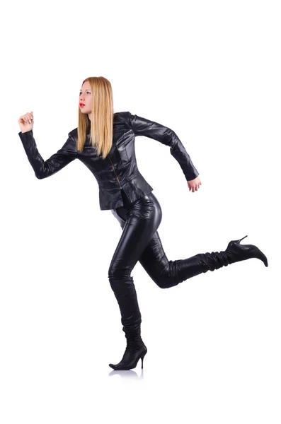 Dancing woman in black leather costume — Stock Photo, Image