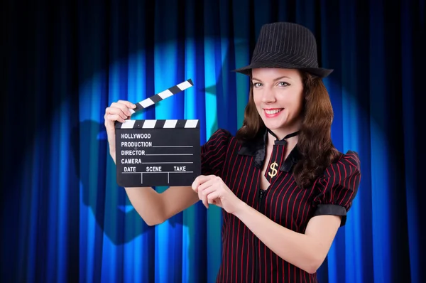 Woman gangster with movie clapper — Stock Photo, Image