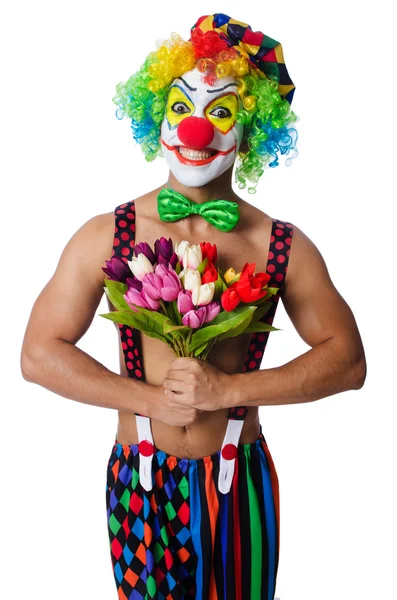 Clown mit Blumen auf weiß — Stockfoto