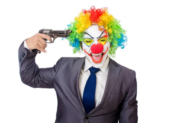 Clown uomo d'affari con pistola isolata su bianco — Foto Stock