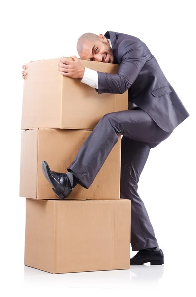 Businessman with box isolated on the white — Stock Photo, Image