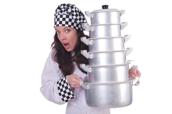 Cook with stack of pots on white — Stock Photo, Image