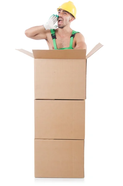 Mann in grünen Overalls mit Schachteln — Stockfoto