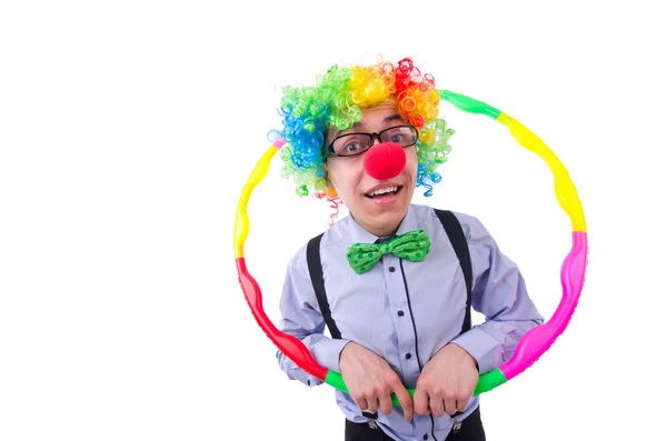 Grappige clown met hoelahoep op wit — Stockfoto