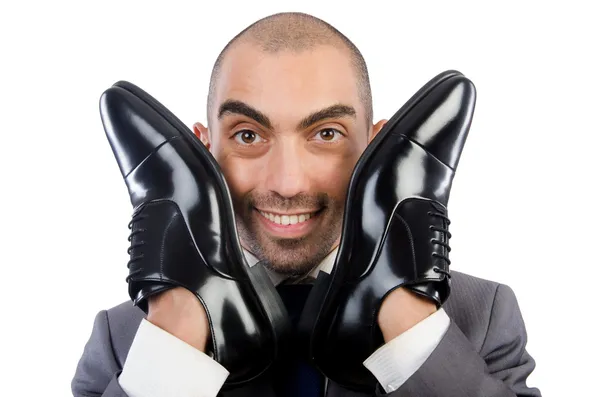 Homme d'affaires avec des chaussures à portée de main — Photo