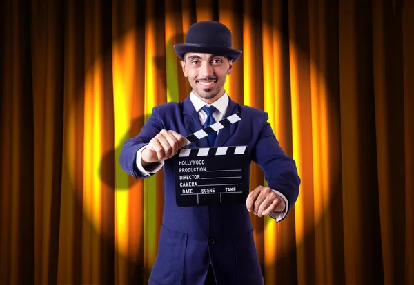 Man with movie clapper — Stock Photo, Image