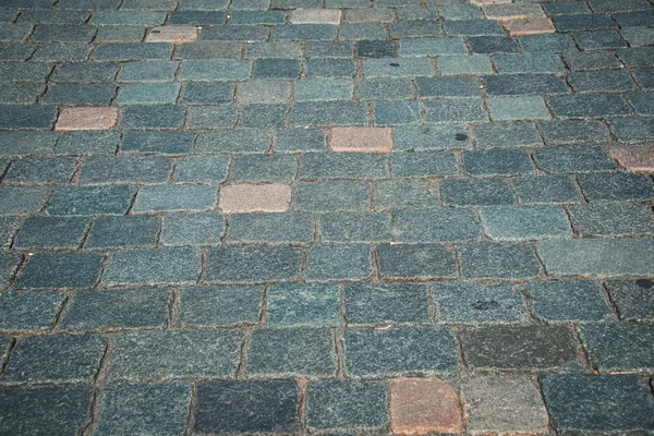 Viejo camino pavimentado con las piedras de guijarro — Foto de Stock