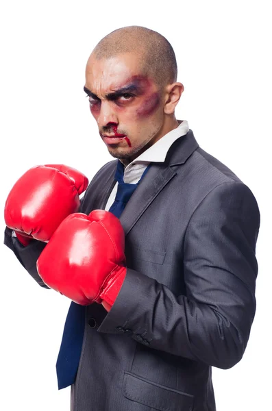 Badly beaten businessman with boxing gloves — Stock Photo, Image