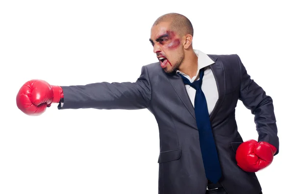 Badly beaten businessman with boxing gloves — Stock Photo, Image