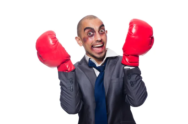 Empresário duramente espancado com luvas de boxe — Fotografia de Stock