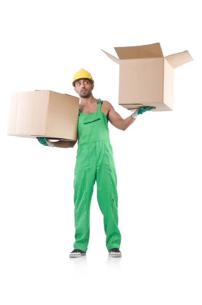 Man in green coveralls with boxes — Stock Photo, Image