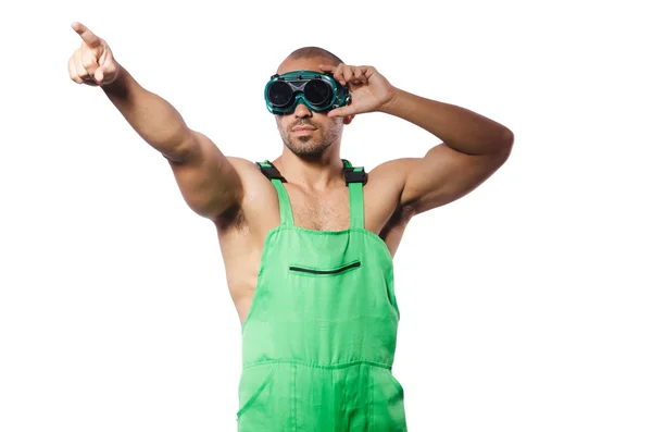 Man in green coveralls with goggles — Stock Photo, Image