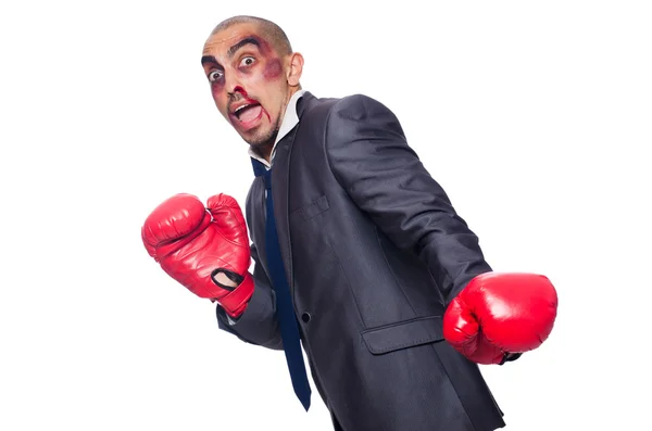 Badly beaten businessman with boxing gloves — Stock Photo, Image