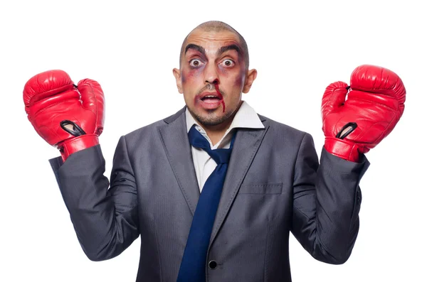 Badly beaten businessman with boxing gloves — Stock Photo, Image