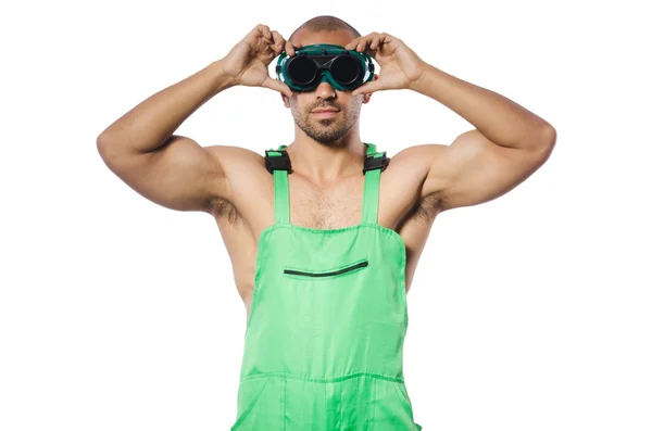 Man in green coveralls with goggles — Stock Photo, Image