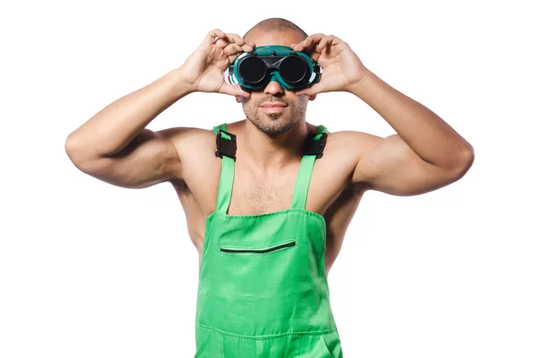 Muž v zelené kombinéze s brýlemi — Stock fotografie