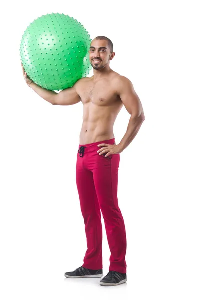 Homme avec ballon suisse faisant des exercices — Photo