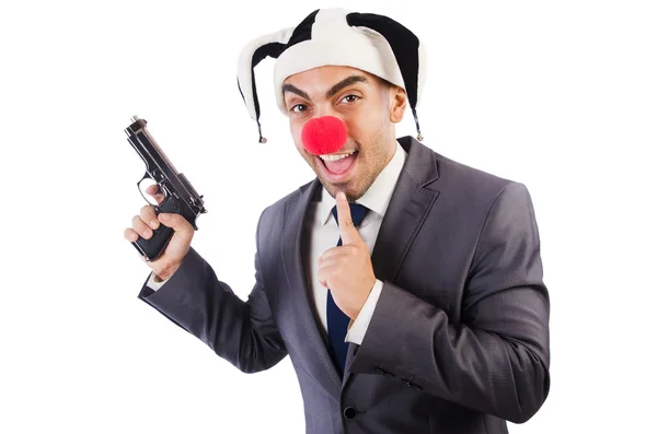 Homme d'affaires clown avec pistolet — Photo