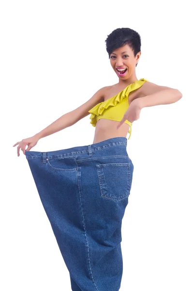 Mujer en concepto de dieta con jeans grandes — Foto de Stock
