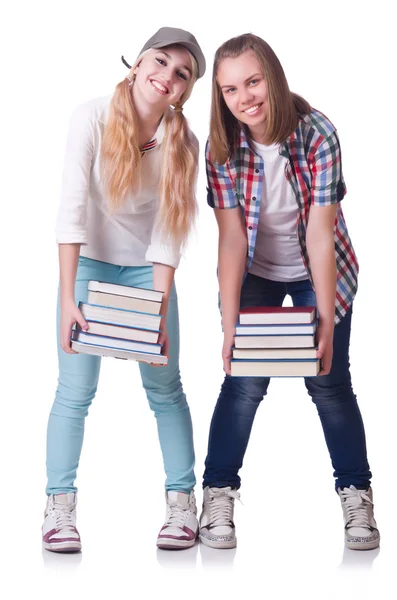 Paar junger Studenten auf weiß — Stockfoto