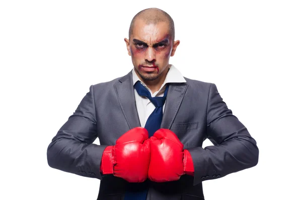 Badly beaten businessman with boxing gloves — Stock Photo, Image