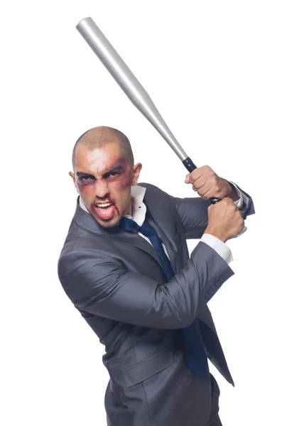 Badly bruised businessman with bat — Stock Photo, Image