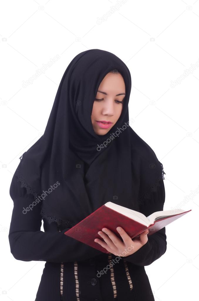Young muslim female student with book