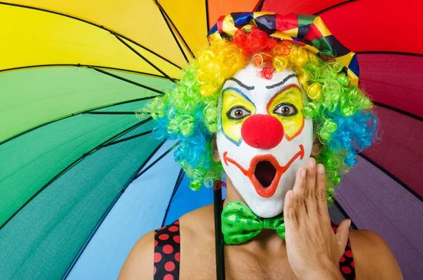 Clown with umbrella — Stock Photo, Image