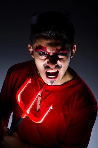 Man in devil costume in halloween concept — Stock Photo, Image