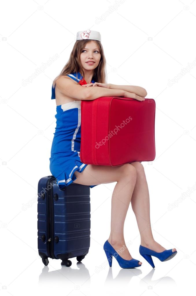 Woman travel attendant with suitcase