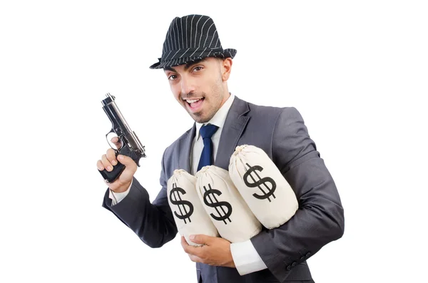 Hombre con armas y sacos de dinero — Foto de Stock