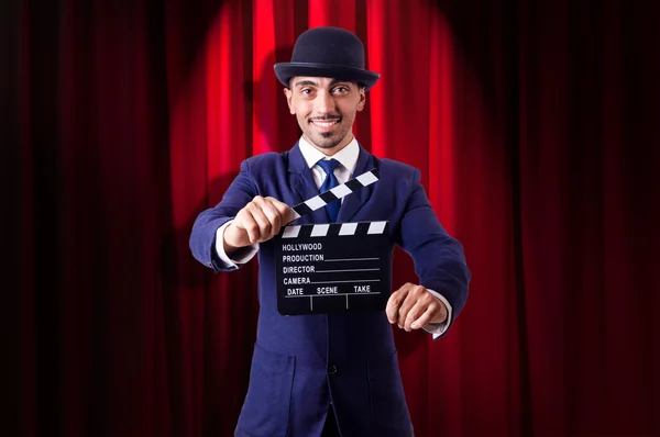 Man with movie clapper — Stock Photo, Image