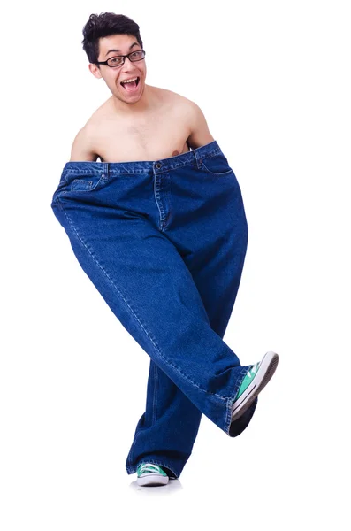Смешной человек с огромными брюками — стоковое фото