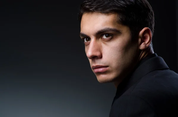 Handsome man in studio shooting — Stock Photo, Image