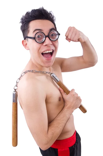 Grappige kerel met nunchucks — Stockfoto