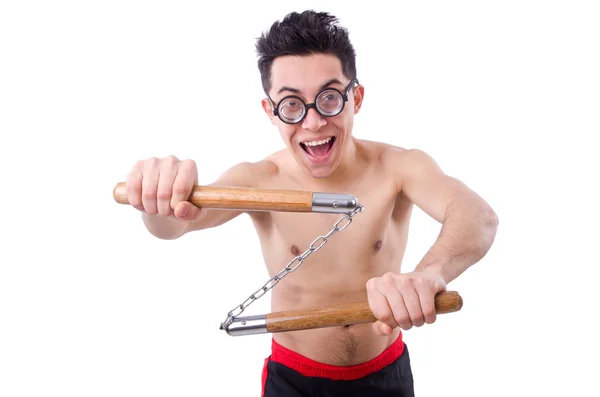 Grappige kerel met nunchucks — Stockfoto