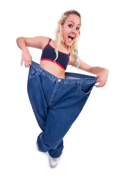 Mujer en concepto de dieta con jeans grandes —  Fotos de Stock