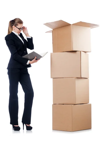 Businesswoman with boxes — Stock Photo, Image