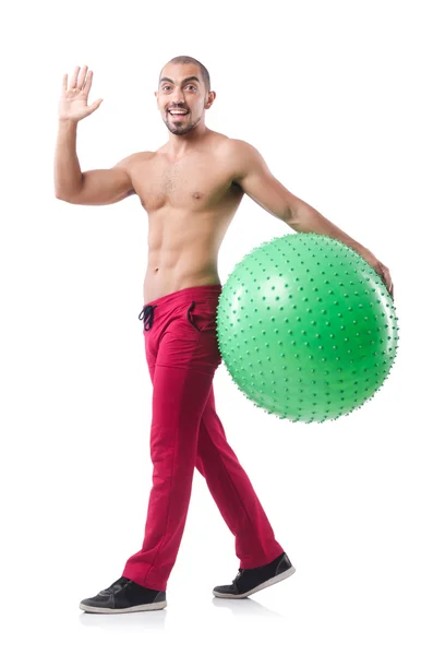 Homme avec ballon suisse faisant des exercices — Photo