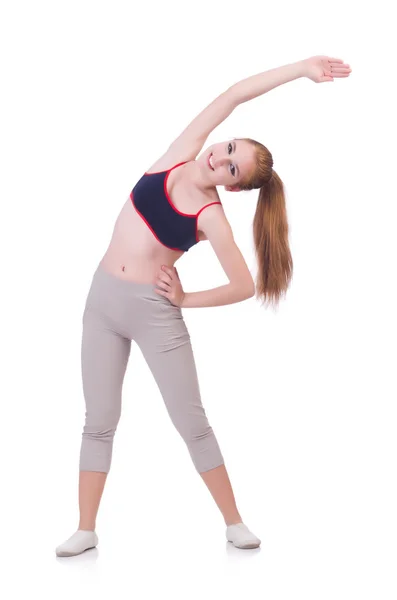 Mujer joven haciendo ejercicios en blanco —  Fotos de Stock