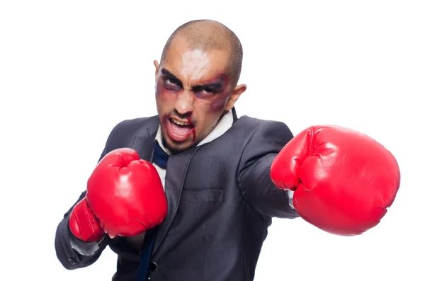 Badly beaten businessman with boxing gloves — Stock Photo, Image