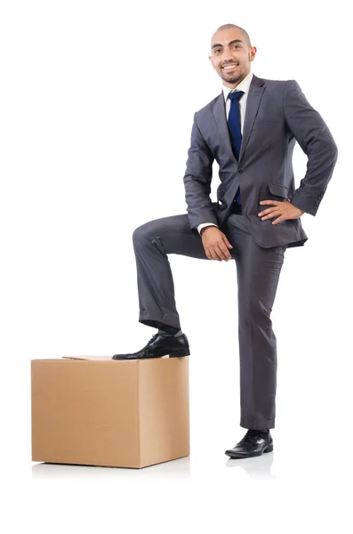 Бизнесмен с коробкой — стоковое фото