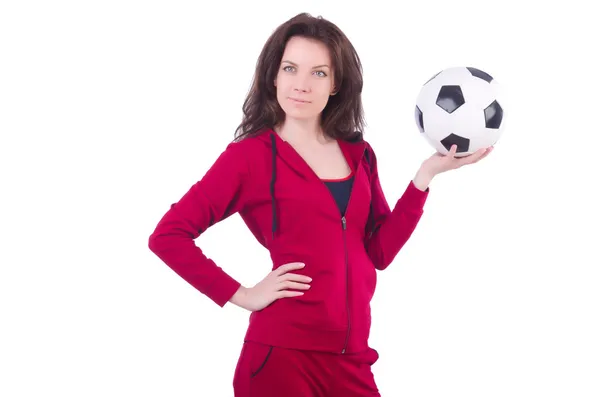 Молода жінка з футбольним м'ячем — стокове фото