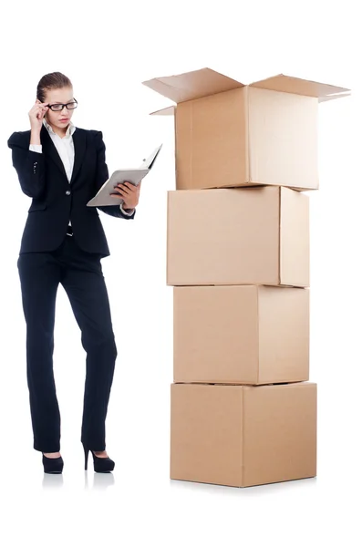 Businesswoman with boxes — Stock Photo, Image