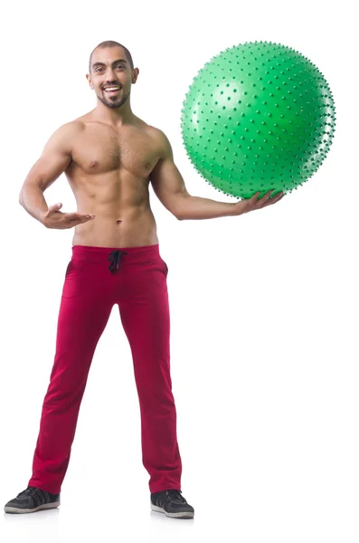 Homme avec ballon suisse faisant des exercices — Photo