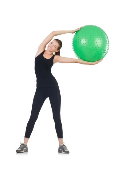 Mladá žena s míčem cvičení — Stock fotografie