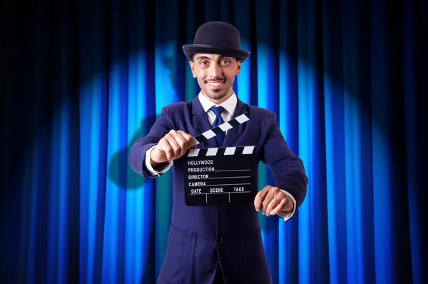 Man with movie clapper — Stock Photo, Image