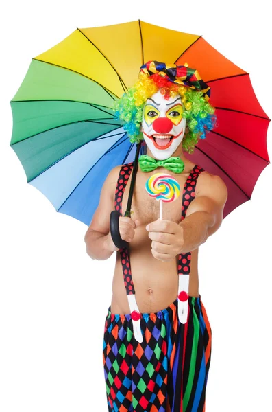 Clown with umbrella and lollypop — Stock Photo, Image