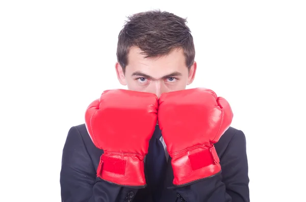 Young businessman in boxing gloves — Stock Photo, Image