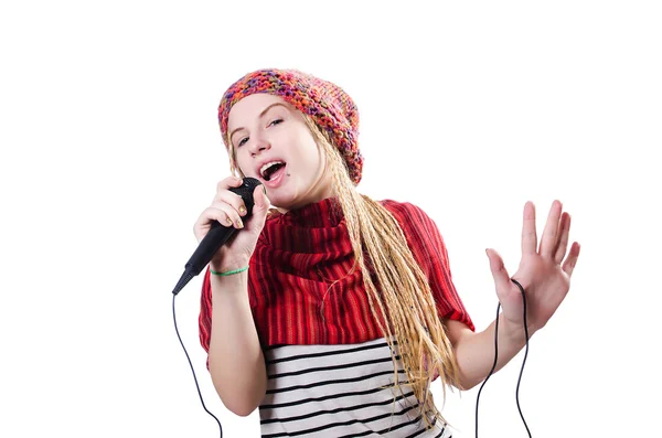Joven cantante femenina con micrófono en blanco —  Fotos de Stock